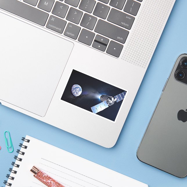 Adesivo Nave Espacial Dragão Xl Com Planeta Terra Em Distâ (Notebook com iPhone)