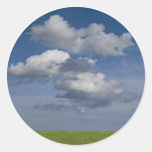 Adesivo o verde arquivou, céu azul, nuvem branca