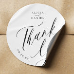 Adesivo Obrigado de casamento para caligrafia elegante voc<br><div class="desc">Simples e elegante favorito de casamento preto e branco obrigado que você cola com um clássico roteiro de caligrafia na moda. Fácil de personalizar com seus detalhes! Adequado para casamentos neutros. Por favor, note que as cores de fundo e texto podem ser alteradas para corresponder ao seu esquema de cor...</div>