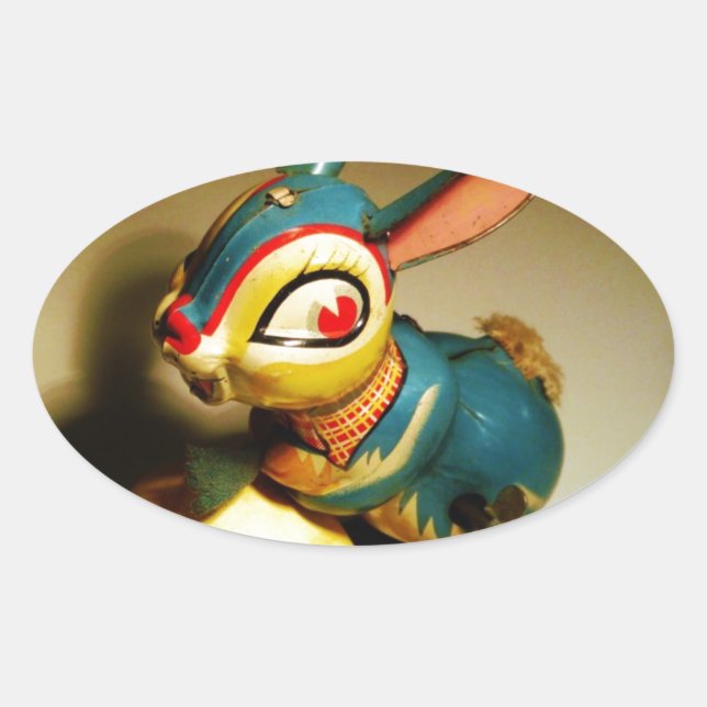 Adesivo Oval coelhos toalha e ovo amarelo páscoa (Frente)