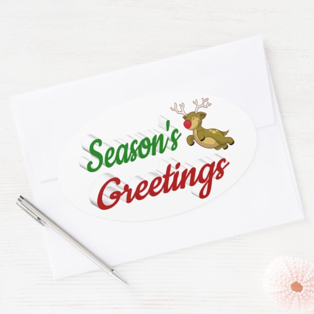 Adesivo Oval Seasons Saudações Voando Reindeer Escrito de Natal (Envelope)