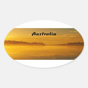 Adesivo Oval Vinheta opaca - nascer do sol do ouro na Austrália