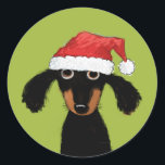 Adesivo Papais noeis de Cachorro Engraçados | Natal Dachsh<br><div class="desc">Um doce adesivo de Natal do amante Dachshund, excelente para selar presentes e envelopes nesta temporada de festas. Adorável cão preto e cabeludo bronzeado vestindo um chapéu de Papai Noel. Uma ilustração original de um desenho animado por ©Jenn Inashvili. Visite o Doodle World de Jenn para ver alguns presentes originais...</div>