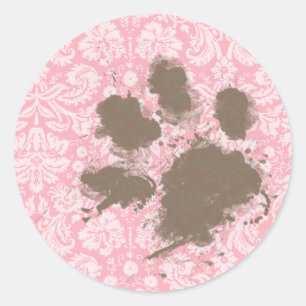 Adesivo Pawprint engraçado no damasco do rosa da pastilha