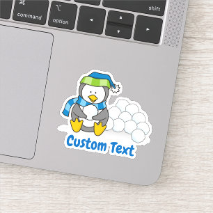 Adesivo Pequeno pinguim sentado com bolas de neve