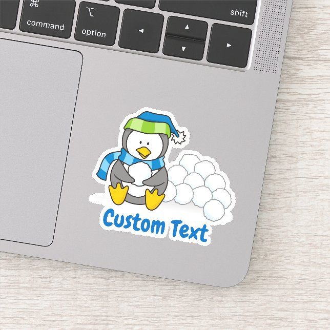 Adesivo Pequeno pinguim sentado com bolas de neve (Detalhe)