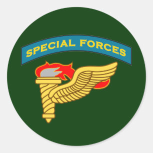 Adesivo Q-aba de SF e crachá do descobridor