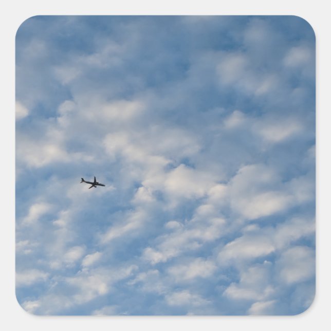 Adesivo Quadrado Airplane Crossing a Cloud-Filled Blue Sky (Frente)