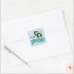 Adesivo Quadrado Amendoins | O Natal é a Alegria de Dar<br><div class="desc">Veja esta divertida design de Natal do Peanuts.</div>