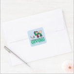 Adesivo Quadrado Amendoins | O Natal é a Alegria de Dar<br><div class="desc">Veja esta divertida design de Natal do Peanuts.</div>