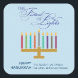 Adesivo Quadrado Azul Colorido Menorah Hanukkah<br><div class="desc">Aqui está um belo visual gráfico para um adesivo de Chanucá. Uma menorah colorida destaca um painel azul pálido listrado com um ornamentado "Festival das Luzes" em um tratamento tipográfico acima. Uma mensagem especial personalizada fica por baixo. Excelente como selos de envelopes ou para colar em embalagens ou presentes de...</div>