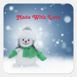 Adesivo Quadrado Boneco de neve com um cachecol verde