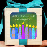 Adesivo Quadrado Chanucá Azul Boho Verde Vela Paz Amor Luz<br><div class="desc">"Paz, amor e luz." Uma ilustração lúdica, moderna e artística das velas de padrão de feto ajuda você a insistir nas festas de Chanucá. Velas azuis cortadas com padrões de folha de alumínio coloridas cobrem um fundo verde rico e profundo. Sinta o calor e a alegria da temporada de festas...</div>