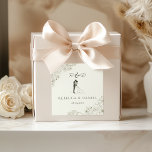 Adesivo Quadrado Elegant Botanical Wedding Monogram Sticker<br><div class="desc">Add a stylish finishing touch to your wedding stationery with this elegant botanical wedding monogram sticker. Featuring delicate floral line art, couple initials, and a romantic silhouette design, this sticker beautifully complements romantic, garden, and minimalist wedding themes. Perfect for sealing envelopes, decorating wedding favors, or adding a coordinated detail to...</div>