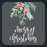 Adesivo Quadrado Evergreen Christmas Sticker Slate<br><div class="desc">Holiday Sticker que diz "natal alegre" numa letra com escrita de pincel com folhagem de inverno com aquarela. Perfeito para selar envelopes! Visite o resto desta coleção para ver mais itens correspondentes.</div>