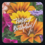 Adesivo Quadrado Feliz Aniversário Vibrante Flores Coloridas da pri<br><div class="desc">Feliz aniversário personaliza o nome das flores de primavera,  azul,  vermelha,  amarela,  verde e violeta.</div>