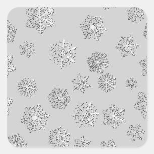 Adesivo Quadrado Flocos de neve prateados em 3D sobre um fundo prat