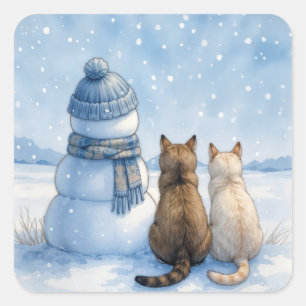 Adesivo Quadrado Gatos Sentados Com um Boneco de Neve em um Campo