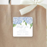 Adesivo Quadrado Hydrangea Azul Obrigado Chá de panela Personalizad<br><div class="desc">Esta bela design apresenta flores azuis de hydrangea e seu texto personalizado. Adicione suas informações usando o formulário modelo. Use para qualquer ocasião. O recurso Personalizar Mais pode ser usado para acessar o menu de edição avançada,  onde você pode alterar a fonte,  as cores e o layout do texto.</div>