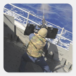 Adesivo Quadrado Os artilheiros acoplam o incêndio de uma