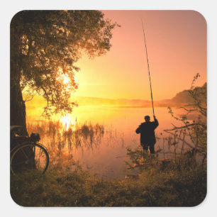 Adesivo Quadrado Silhueta do pescador no lago no por do sol