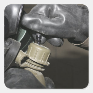 Adesivo Quadrado Um fuzileiro naval introduz um tubo do bebendo em