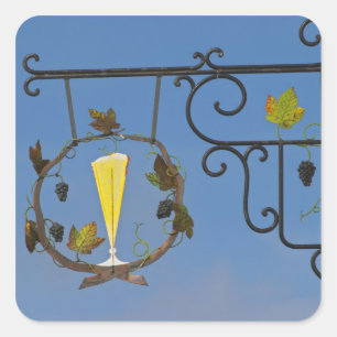 Adesivo Quadrado Um letreiro de ferro forjado que ilustra o tema