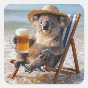 Adesivo Quadrado Urso Koala Com uma Cerveja na Praia