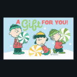 Adesivo Retangular Amendoins | Um presente para você<br><div class="desc">As designs de Natal de Charles Schulz,  que incluem os amendoins,  capturam a essência da inocência infantil e o espírito que anima a época de férias.</div>