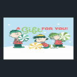 Adesivo Retangular Amendoins | Um presente para você<br><div class="desc">As designs de Natal de Charles Schulz,  que incluem os amendoins,  capturam a essência da inocência infantil e o espírito que anima a época de férias.</div>