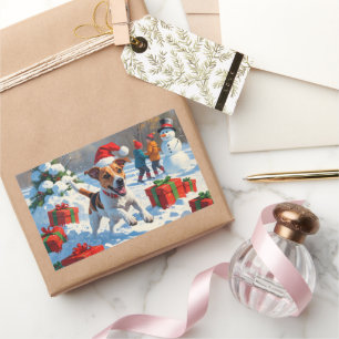 Adesivo Retangular Jack Russell correndo em neve com chapéu de Natal