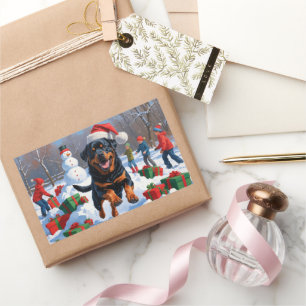 Adesivo Retangular Rottweiler Correndo na Neve com Chapéu de Natal