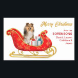 Adesivo Retangular Shetland Sheepdog Christmas Sleigh<br><div class="desc">Nessas vinhetas decorativas de Férias, um Shetland Sheepdog se senta em um bonito trenó decorativo vermelho e ouro. Ao lado do cão, os pacotes de presentes são amarrados com arcos coloridos. O texto dourado à direita diz "MERRY CHRISTMAS" e o texto personalizado está vermelho. Perfeito para sua correspondência de Natal...</div>