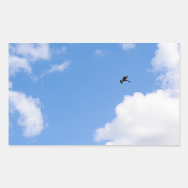 Adesivo Retangular Solitary Bird Soaring Through Bright Blue Sky with (Frente)