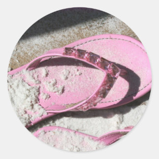 Adesivo Sandálias cor-de-rosa sacudir flutuante na praia d