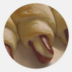 Adesivo Suínos num cobertor com queijo