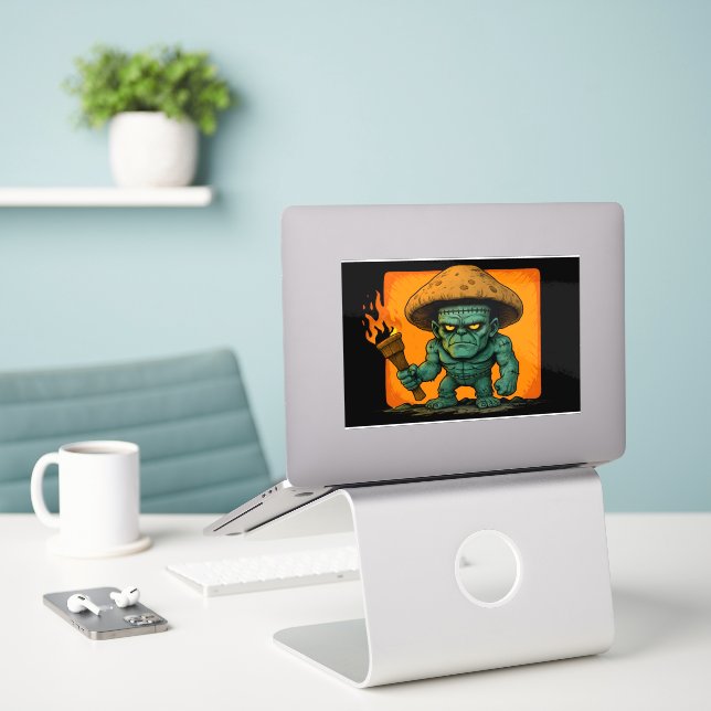 Adesivo Torch & Temper – Design do Monstro Cogumelo (Laptop na mesa)