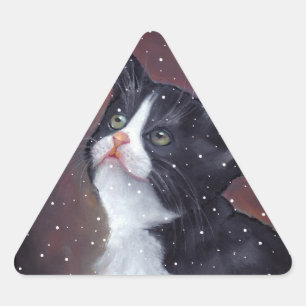 Adesivo Triangular Gato do smoking que olha acima nos flocos de neve,