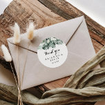 Adesivo Verde Tropical Branca Obrigado A Favor Do Casament<br><div class="desc">Este obrigado branco verde tropical que você fez para o casamento... O cola redondo clássico é perfeito para um casamento rústico. A design apresenta palmeiras verdes folhas buquês com flores brancas adoráveis. Faça com que a etiqueta do adesivo seja sua, incluindo seus nomes, o evento (se aplicável) e a data....</div>