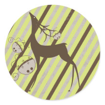 Vinheta-redonda com riscas diagonais e veados