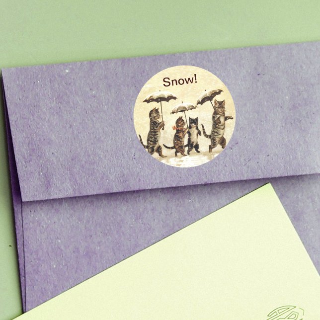 Adesivo Vintage Cats Umbrellas Snow (Four striped cats walking upright with umbrellas in snow on yellow round stickers.)