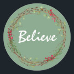 Adesivo Winter Greenery Berries Wreath Christmas Acredita<br><div class="desc">Vedante de envelope festivo elegante e moderno ou adesivo de presente para o Natal com o texto "Acredite" na caligrafia branca em um fundo verde e um toque de na moda do verde de inverno e da coroa de frutas. Desenvolvido exclusivamente para você pelo Happy Dolphin Studio. Se precisar de...</div>