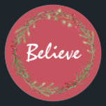 Adesivo Winter Greenery Berries Wreath Christmas Acredita<br><div class="desc">Vedante de envelope festivo elegante e moderno ou adesivo de presente para o Natal com o texto "Acredite" na caligrafia branca em um fundo vermelho e um toque de na moda do verde de inverno e da coroa de frutas. Desenvolvido exclusivamente para você pelo Happy Dolphin Studio. Se precisar de...</div>