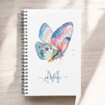 Agenda Borboleta Colorida de Aquarela com Monograma<br><div class="desc">Uma bela borboleta aquosa em tons vívidos de azul, aqua, rosa, laranja e branco lembra uma beleza da natureza encontrada nessas criaturas magníficas. Um modelo de texto moderno é usado para personalizar com seu nome e inicial de monograma. Ao personalizar seu nome no design, deixe os pequenos símbolos de caixa...</div>