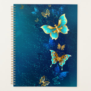 Agenda Borboletas de ouro em um fundo azul