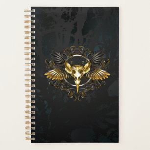 Agenda Caveira de Pássaro Dourada em fundo Preto