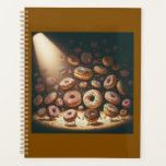 Agenda Dancing Doughnuts Surreal Bakery<br><div class="desc">organize your days with a touch of sugary magic in this whimsical spiral planner featuring a surreal scene of dancing doughnuts under a theatrical spotlight. perfect for students, bakers, or office professionals, this unique stationary item combines practical scheduling with a fun and artistic food illustration. the vibrant colors of the...</div>