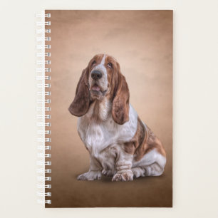 Agenda Desenhando um cão de Caça do Basset engraçado