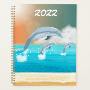 Agenda golfinho rompendo a superfície do oceano