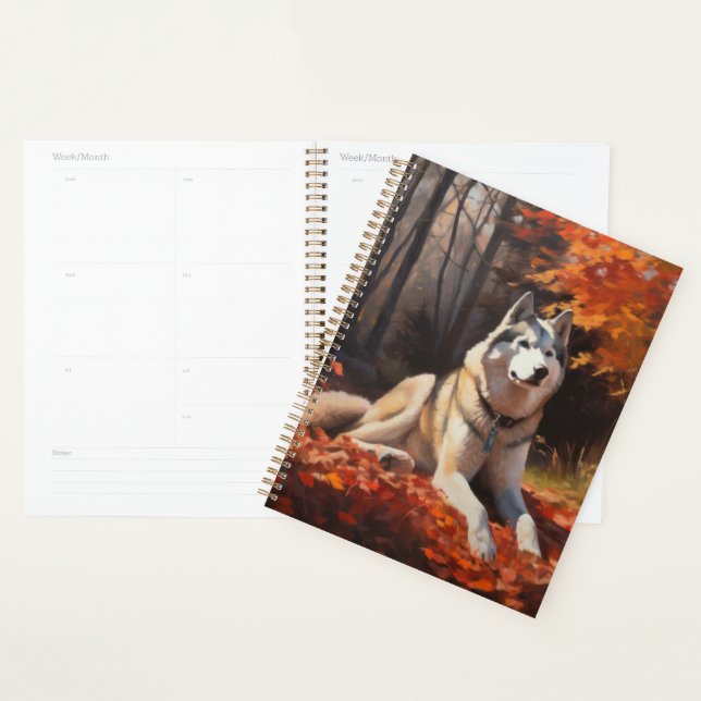 Agenda Husky Siberiano nas Folhas do outono cai inspirado (Exibição)